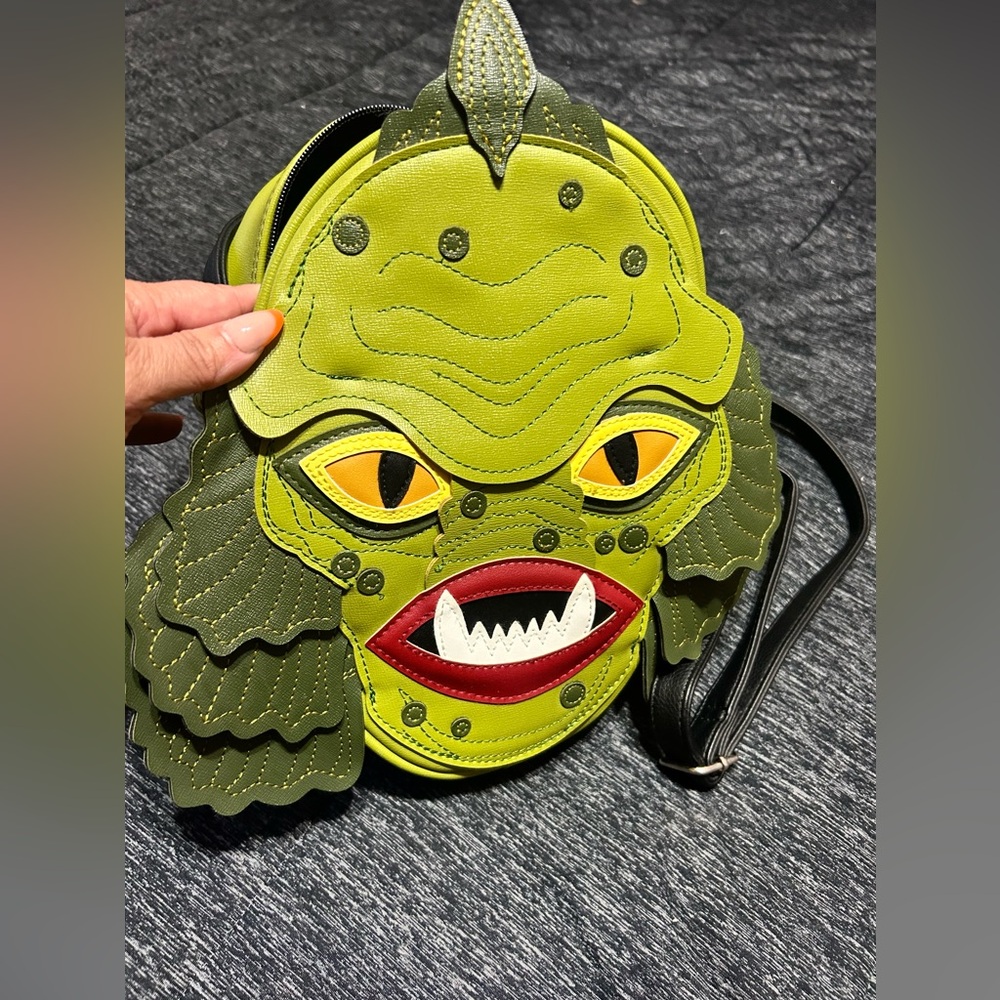 Love pain and stitches x vixen collab , 8 in wide 10 in tall, creature purse EUC